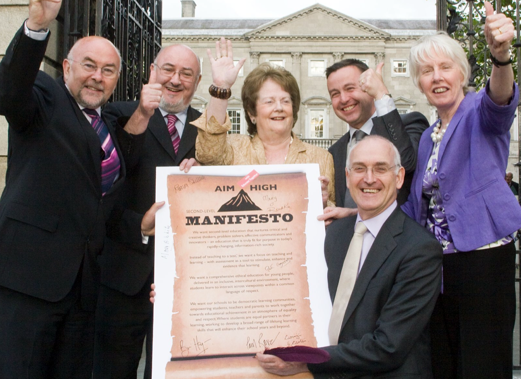Cross party support: Ruairí Quinn TD (Labour), Caoimhghín Ó Caoláin TD (Sinn Féin), Mary O'Rourke TD (Fianna Fáil), Brian Hayes TD (Fine Gael), and Mary White TD (Green Party) with CEO Paul Rowe pledging support for the second-level campaign in 2011